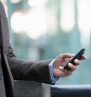 Person holding cell phone 